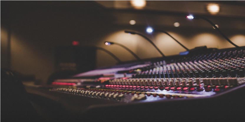 Professional mixing console in a recording studio